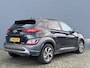 Hyundai Kona 1.6 GDI HEV 141pk Fashion Sky | Schuif- kanteldak | Trekhaak I HUD I Navigatie