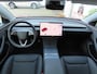 Tesla Model 3 RWD Premium Highland/ Afneembare trekhaak/ Warmtepomp/ LFP accu/ Stoel + stuurwiel verwarming/ Panoramadak/ Origineel NL/ NAP