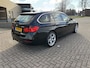 BMW 3-Serie Touring 320i Executive Sport Automaat [ fm navi,ecc,xenon,18``lmv,afn trekhaak ]