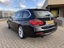 BMW 3-Serie Touring 320i Executive Sport Automaat [ fm navi,ecc,xenon,18``lmv,afn trekhaak ]