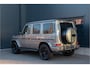 Mercedes-Benz G-klasse 500 AMG | ACC | 360 Cam | Burmester 4D | Massage & Ventilatie | Carbon | Lane & Side Assist | Trekhaak 3500kg | Dynamic Select | Garagedeuropener | Treeplanken | Sfeerverlichting | Dealer Onderhouden | Nightpakket | Mojavezilver Metallic | Stoel & Bankverwarming | V8 422PK | Alarm.