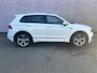Volkswagen Tiguan 1.5 TSI ACT Highline Business R-line | Elektrisch bedienbare bestuurdersstoel | 360 graden camera | Parkeersensoren voor + achter | Panorama dak | Elektrisch schuif/kantel dak | Elektrisch bedienbare trekhaak | 19 Inch lichtmetalen velgen | Elektrisch bedienbare achterklep | Lederen bekleding | DSG Automaat |