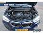 BMW X1 sDrive18i Centennial High Executive Leer / Trekhaak / Navi / Automaat / PDC / Clima / Stoelverw. etc etc.