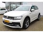 Volkswagen Tiguan 1.4 TSI Highline Business R-Line | Incl. 12 maanden Garantie | Panorama dak | Stoelverwarming | Achteruitrijcamera | Elektrische kofferbakklep | Adaptive cruise controle | DAB | Apple CarPlay/Android Auto | Virtual cockpit | Climate controle | Navigatie | Draadloze telefoonlader | Parkeersensoren V+A | Origineel NL Auto | NAP |