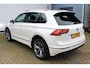 Volkswagen Tiguan 1.4 TSI Highline Business R-Line | Incl. 12 maanden Garantie | Panorama dak | Stoelverwarming | Achteruitrijcamera | Elektrische kofferbakklep | Adaptive cruise controle | DAB | Apple CarPlay/Android Auto | Virtual cockpit | Climate controle | Navigatie | Draadloze telefoonlader | Parkeersensoren V+A | Origineel NL Auto | NAP |
