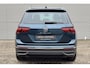 Volkswagen Tiguan 1.5 TSI R-Line Business+ / Facelift Model / Standkachel / Navigatie / Dode Hoek detectie / Electrische trekhaak / Automatisch inparkeren / Keyless Entry & Keyless start / Stoelverwarming voor / Electrisch uitklapbare trekhaak / Digitaal dashboard /