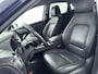 Hyundai Kona Electric EV PREMIUM 64 kWh | TREKHAAK | WARMTEPOMP | 3 FASE | LEDER | NAVI | CLIMA | CRUISE | CAMERA | APPLE CAR PLAY & ANDROID AUTO | STUUR- & STOELVERWARMING | 16'' LM VELGEN | PDC | PRIVACY GLASS |