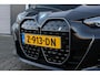 BMW i4 EDrive35 70 kWh M-Sport | Fabrieksgarantie & Schuif-/kanteldak | Nette en complete Nederlandse I4 (BTW auto)