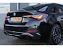 BMW i4 EDrive35 70 kWh M-Sport | Fabrieksgarantie & Schuif-/kanteldak | Nette en complete Nederlandse I4 (BTW auto)