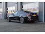 BMW i4 EDrive35 70 kWh M-Sport | Fabrieksgarantie & Schuif-/kanteldak | Nette en complete Nederlandse I4 (BTW auto)