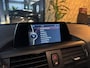 BMW 1-Serie 116i Executive Garantie Afn. Trekhaak StoelVW Navi Keyless Rijklaar