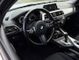BMW 1-Serie 118i Sport Cruise Clima PDC LED 18'' M velgen + M-Stuur