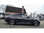 BMW i4 M50 High Executive 84 kWh | BTW | 360 Camera | LASER | Dravitgrau metallic | Adaptieve Cruise | Trekhaak | Schuif/kanteldak