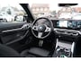 BMW i4 M50 High Executive 84 kWh | BTW | 360 Camera | LASER | Dravitgrau metallic | Adaptieve Cruise | Trekhaak | Schuif/kanteldak