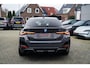 BMW i4 M50 High Executive 84 kWh | BTW | 360 Camera | LASER | Dravitgrau metallic | Adaptieve Cruise | Trekhaak | Schuif/kanteldak