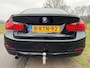 BMW 3-Serie 320i EfficientDynamics Edition Business 2de eigenaar met navigatie en trekhaak