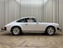 Porsche 911 3.0SC Coupé / Matching Numbers / Grand Prix White / Fuchs / 1978 / Schuifdak