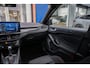 Ford Focus Wagon 1.0 EcoBoost Hybrid ST Line | Trekhaak | Stoel/stuur/voorruit verwarming | Cruise adaptief | Dodehoek detectie | Camera | Apple Carplay/Android Auto | Achteruitrijcamera | Apple Carplay/Android Auto|telefoonintegratie premium | Cruise control adaptief met Stop&Go en stuurhulp