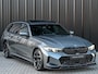 BMW 3-Serie Touring 330e xDrive · M sport · Accu 19,5kWh · Trekhaak · Panoramadak · Active Cruise · Panoramadak · Camera · Ambiance interieur · Full styling kit