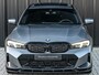 BMW 3-Serie Touring 330e xDrive · M sport · Accu 19,5kWh · Trekhaak · Panoramadak · Active Cruise · Panoramadak · Camera · Ambiance interieur · Full styling kit
