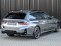 BMW 3-Serie Touring 330e xDrive · M sport · Accu 19,5kWh · Trekhaak · Panoramadak · Active Cruise · Panoramadak · Camera · Ambiance interieur · Full styling kit