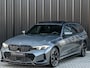 BMW 3-Serie Touring 330e xDrive · M sport · Accu 19,5kWh · Trekhaak · Panoramadak · Active Cruise · Panoramadak · Camera · Ambiance interieur · Full styling kit