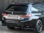 BMW 3-Serie Touring 330e xDrive · M sport · Accu 19,5kWh · Trekhaak · Panoramadak · Active Cruise · Panorama dak · Camera · Ambiance interieur ·