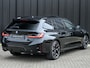 BMW 3-Serie Touring 330e xDrive · M sport · Accu 19,5kWh · Trekhaak · Panoramadak · Active Cruise · Panoramadak · Camera · Ambiance interieur ·