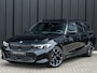 BMW 3-Serie Touring 330e xDrive · M sport · Accu 19,5kWh · Trekhaak · Panoramadak · Active Cruise · Panoramadak · Camera · Ambiance interieur ·