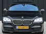 BMW 7-Serie 740i · M-sport · NL-auto · 360 Camera · Active cruise · Memory seats · Comfort access · Harman/Kardon · Schuif-/kanteldak · Achterbank verwarmd