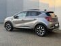 Renault Captur 1.6 E-Tech full hybrid 145 techno / Schuif & Kanteldak / Dealer Onderhouden / Adaptieve Cruise / Stoel & Stuurwielverwarming / Navigatie / AppleCarplay & Android Auto / Dodehoek Detectie / Camera / Volledig digitaal instrumentenpaneel / LED / DAB /