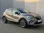 Renault Captur 1.6 E-Tech full hybrid 145 techno / Schuif & Kanteldak / Dealer Onderhouden / Adaptieve Cruise / Stoel & Stuurwielverwarming / Navigatie / AppleCarplay & Android Auto / Dodehoek Detectie / Camera / Volledig digitaal instrumentenpaneel / LED / DAB /