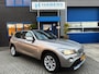BMW X1 XDrive28i Business 245PK|Navi|Xenon|Automaat|Panoramadak|Sportstoelen|Leder bekleding|Trekhaak|4x4|StoelVW|Clima|PDC|Isofix