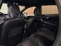 Volvo V40 2.0 T4 Business Sport Stoelverwarming | Parkeercamera | Cruise Control | Climate Control L+R | Parkeersensoren achter | 17 Inch | Alcantara/Lederen R-Design bekleding met witte bies en stiksel | Bluetooth telefoon en audio streaming | Navigatie | Adaptief TFT instrumentenpaneel met 3 instellingen | Regensensor | Automatisch dimmende binnenspiegel met frameless design | Elektrisch inklapbare buitenspiegels | Uitschuifbare midden armsteun | Netjes onderhouden! | Osmium Grey Metallic |