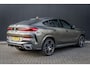 BMW X6 xDrive40i High Executive HUD | H&K | Pano | Luchtvering | 360 Camera | Stuurverwarming | Memory seats | Trekhaak | Adapt. Cruise Control + Zelfsturende functie