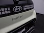 Hyundai Inster Pulse 49 kWh |Winterpakket | Draadloos laden | Parkeersensoren | Stoelverwarming | Warmtepomp | Stuurverwarming |