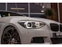 BMW 1-Serie 116i F20 Executive M-sport | M-pakket | Automaat | Alcantara | Xenon | 18 inch | Sportstoelen | Stoelverwarming | Navi | Bluetooth | Climate control | PDC