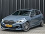 BMW 1-Serie M135i xDrive High Executive · M- sport · Panoramadak · Camera · Active cruise · Harman/Kardon · Adaptive Suspension · M Sportbrake · Ambiance verlichting