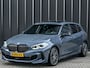 BMW 1-Serie M135i xDrive High Executive · M- sport · Panoramadak · Camera · Active cruise · Harman/Kardon · Adaptive Suspension · M Sportbrake · Ambiance verlichting