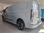 Ford Transit Custom 320 2.5 PHEV L2H1 Sport | 19 INCH VELGEN | INKLAPBARE TREKHAAK | VERWARMBAAR STUURWIEL | CENTRALE DUBBELE VERGRENDELING | PREMIUM LAK: GREY MATTER | ADAPTIVE CRUISE CONTROL | PROGRAMMEERBARE VOERTUIG INTERFACE