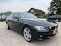 BMW 3-Serie 320i High Executive Org. NL | Navi | Leer | PDC | NAP