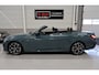 BMW 4-Serie Cabrio 420i High Executive M-Sport Sportstoelen Camera Stoelverwarming Curved dashboard Navigatie Airco-ecc 19 inch Sportvelgen App connect Cape York Green metallic Zwart sportleer