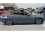 BMW 4-Serie Cabrio 420i High Executive M-Sport Sportstoelen Camera Stoelverwarming Curved dashboard Navigatie Airco-ecc 19 inch Sportvelgen App connect Cape York Green metallic Zwart sportleer