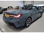 BMW 4-Serie Cabrio 420i High Executive M-Sport Sportstoelen Camera Stoelverwarming Curved dashboard Navigatie Airco-ecc 19 inch Sportvelgen App connect Cape York Green metallic Zwart sportleer