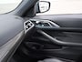 BMW 4-Serie Cabrio 420i High Executive M-Sport Sportstoelen Camera Stoelverwarming Curved dashboard Navigatie Airco-ecc 19 inch Sportvelgen App connect Cape York Green metallic Zwart sportleer