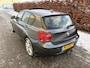 BMW 1-Serie 114i Business+ / SPORT / LEER / SCHUIFDAK / NAVI / STOELVERWARMING