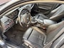 BMW 1-Serie 114i Business+ / SPORT / LEER / SCHUIFDAK / NAVI / STOELVERWARMING