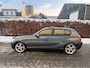 BMW 1-Serie 114i Business+ / SPORT / LEER / SCHUIFDAK / NAVI / STOELVERWARMING