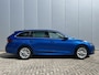 Skoda Octavia Combi 1.5 TSI 150 pk First Edition Trekhaak Navi Led Matrix Stoelverwarming Adaptieve Cruise ACC Carplay PDC v+a Chroom Rails Extra Getint Glas NL Auto