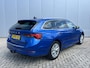 Skoda Octavia Combi 1.5 TSI 150 pk First Edition Trekhaak Navi Led Matrix Stoelverwarming Adaptieve Cruise ACC Carplay PDC v+a Chroom Rails Extra Getint Glas NL Auto
